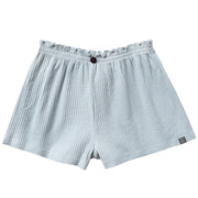 Light blue boxer shorts with a small logo on a white background